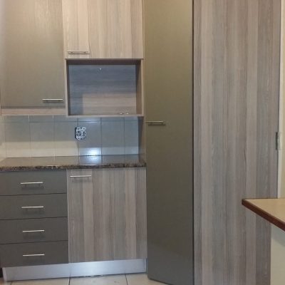 Kitchen revamp using Coimbra and Espresso melamine and Mocha Granite formica tops