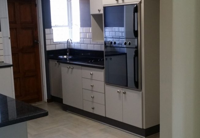 Kitchen renovation done with Folkstone Grey and Rustenburg granite tops
