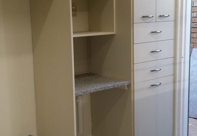 Kitchen Renovation with Cappuccino Melamine and Crema Rosita granite tops