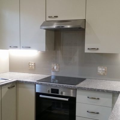 Kitchen Renovation with Cappuccino Melamine and Crema Rosita granite tops