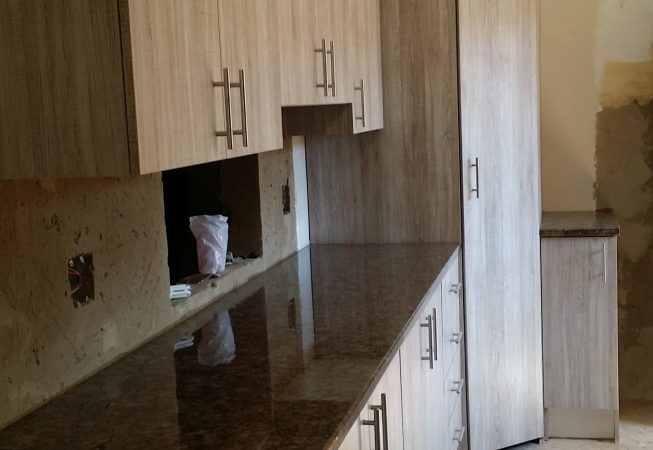 Kitchen renovation in Lanza Oak Melamine and Mocha Granite formica worktops