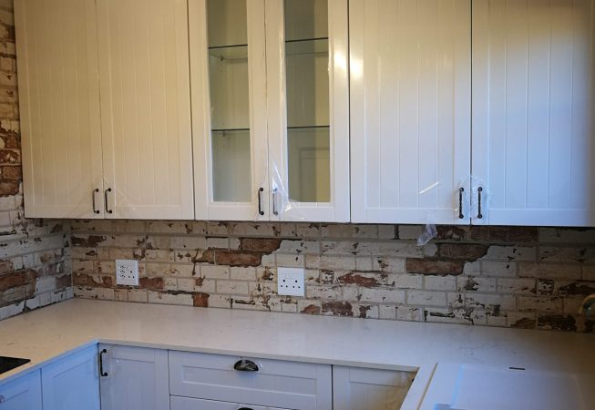 Kitchen revamp with White Wrap Shaker doors with Vanilla quartz tops