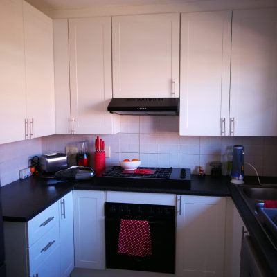 Kitchen facelift with white wrap doors