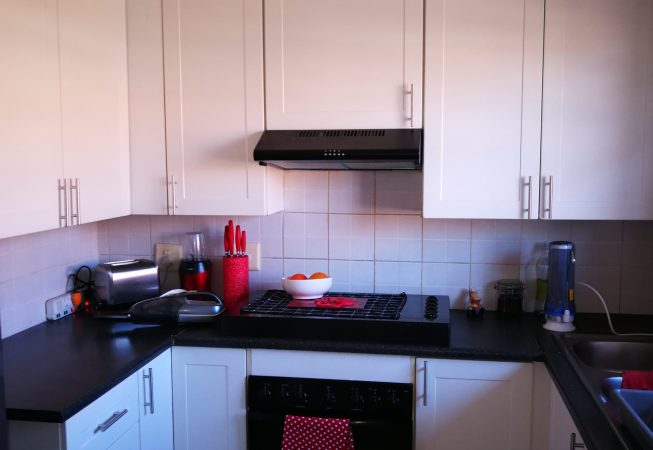 Kitchen facelift with white wrap doors