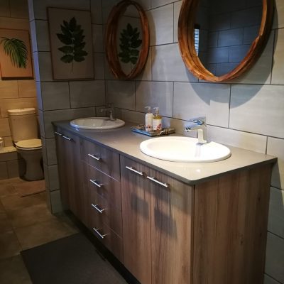 Main en-suite double vanity in Sahara melamine