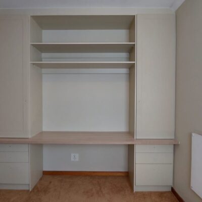 Built-in study desk and cupboards in Cappuccino melamine and wrap doors with 32mm Shale Oak top