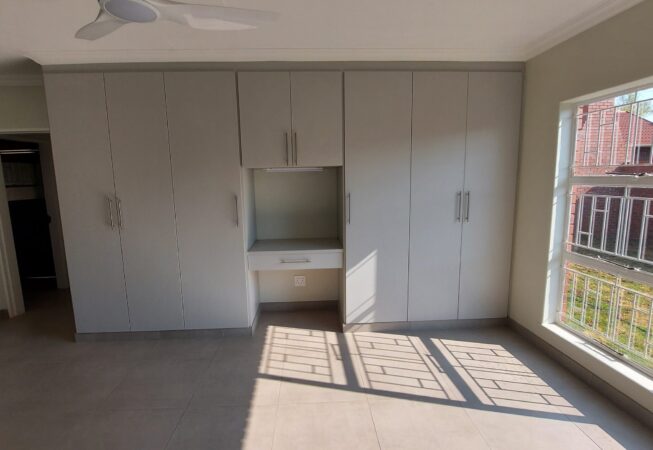 Main Bedroom Cupboards replaced Folkstone Grey melamine