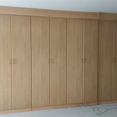 Office cupboard installation using Maple melamine