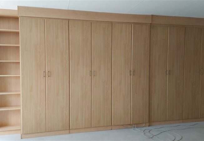 Office cupboard installation using Maple melamine