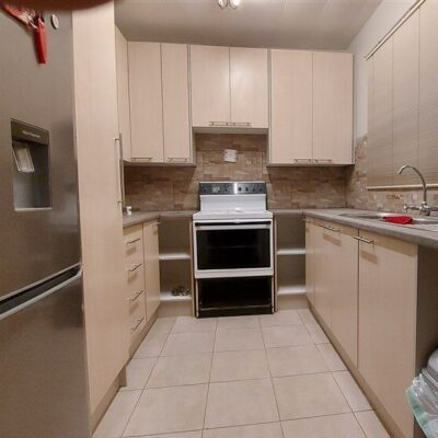 Kitchen upgrade using Balsa and Congo melamine with Downtown formica tops