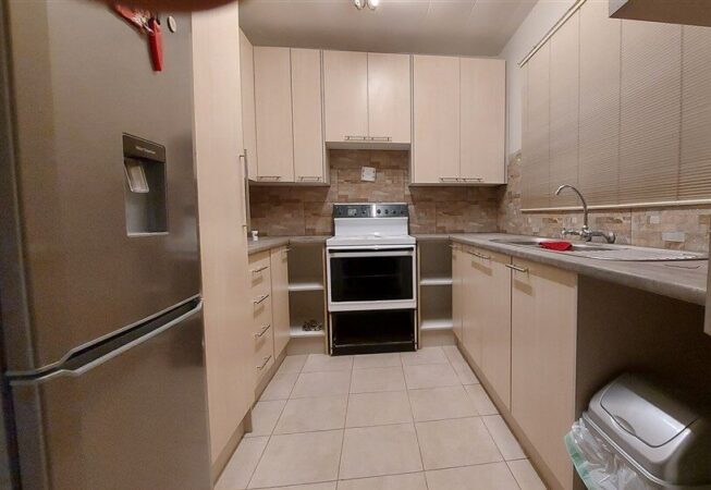 Kitchen upgrade using Balsa and Congo melamine with Downtown formica tops