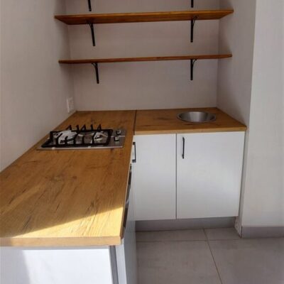 Kitchenette installation using White melamine with Saxon Oak formica tops