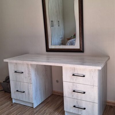 Custom made desk with one 2 drawer file cabinet unit and one 3 drawer unit. Made with Lockeport melamine for units and custom made top.