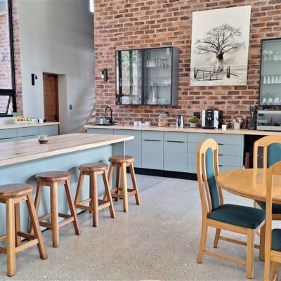New kitchen installation using Caraz and Vermont Slate melamine with solid Maple tops. Glass wall units with LED lighting inside.