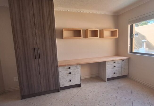 Anchor Point melamine cupboard with Elmina drawer units. Solid Saligna top and wall boxes