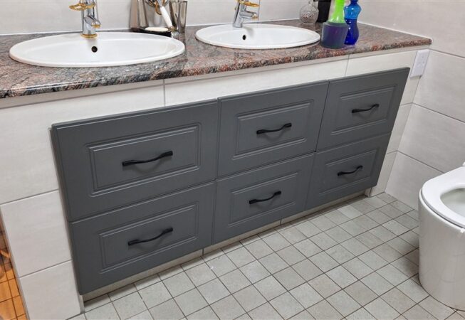 Built-in vanity Storm grey wrap drawers cabinet installation.