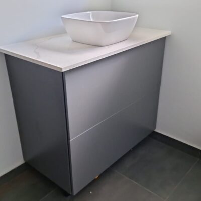 Bathroom revamp using Folkstone Grey melamine with Vanilla quartz top
