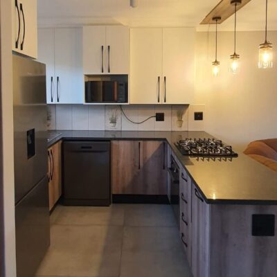 Kitchen revamp using White and Camden melamine with Rustenburg granite tops