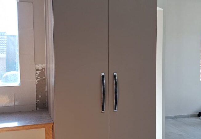 Kitchen revamp using Congo melamine grocery unit with internal LED lights and larder unit