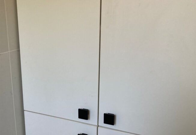 Bathroom cupboard using white melamine