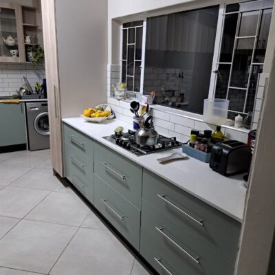 Kitchen revamp using Caraz, Congo and Arden Melamine with Vanilla quarts tops